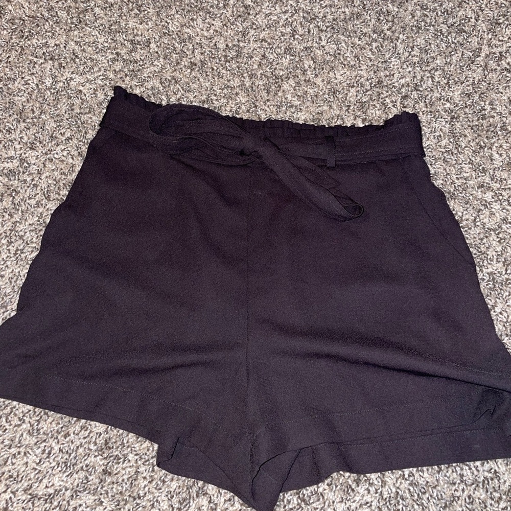 High waisted stretch shorts from Lauren Conrad. Size small. Attached belt.